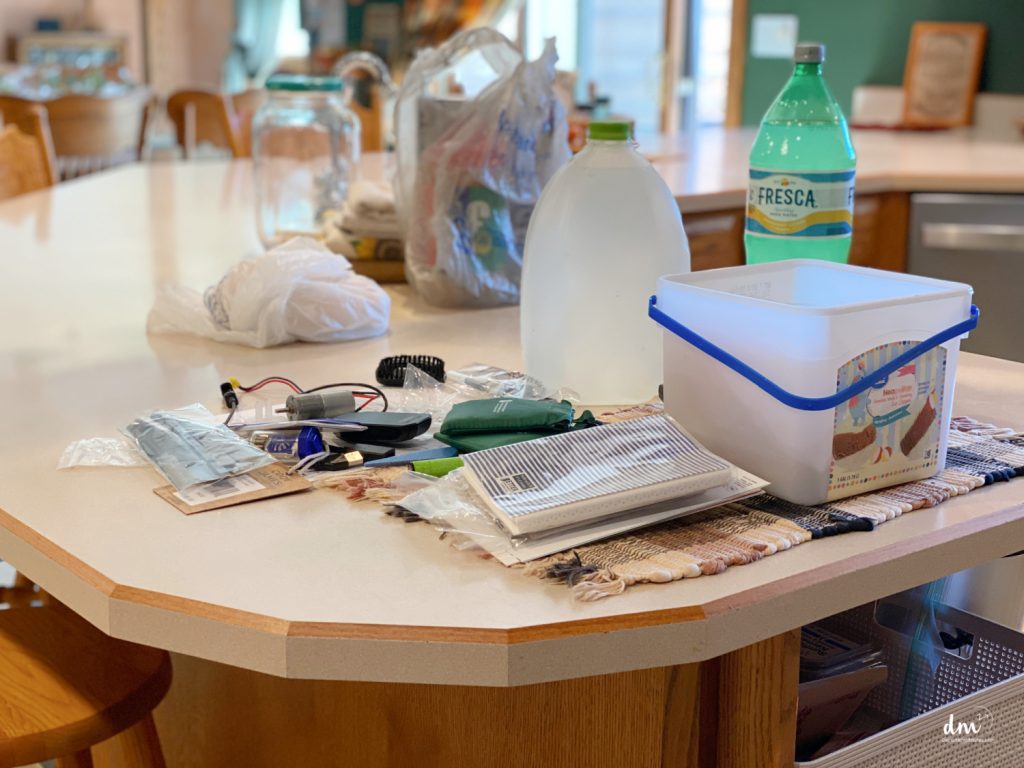 clutter and mess scattered on a kitchen counter