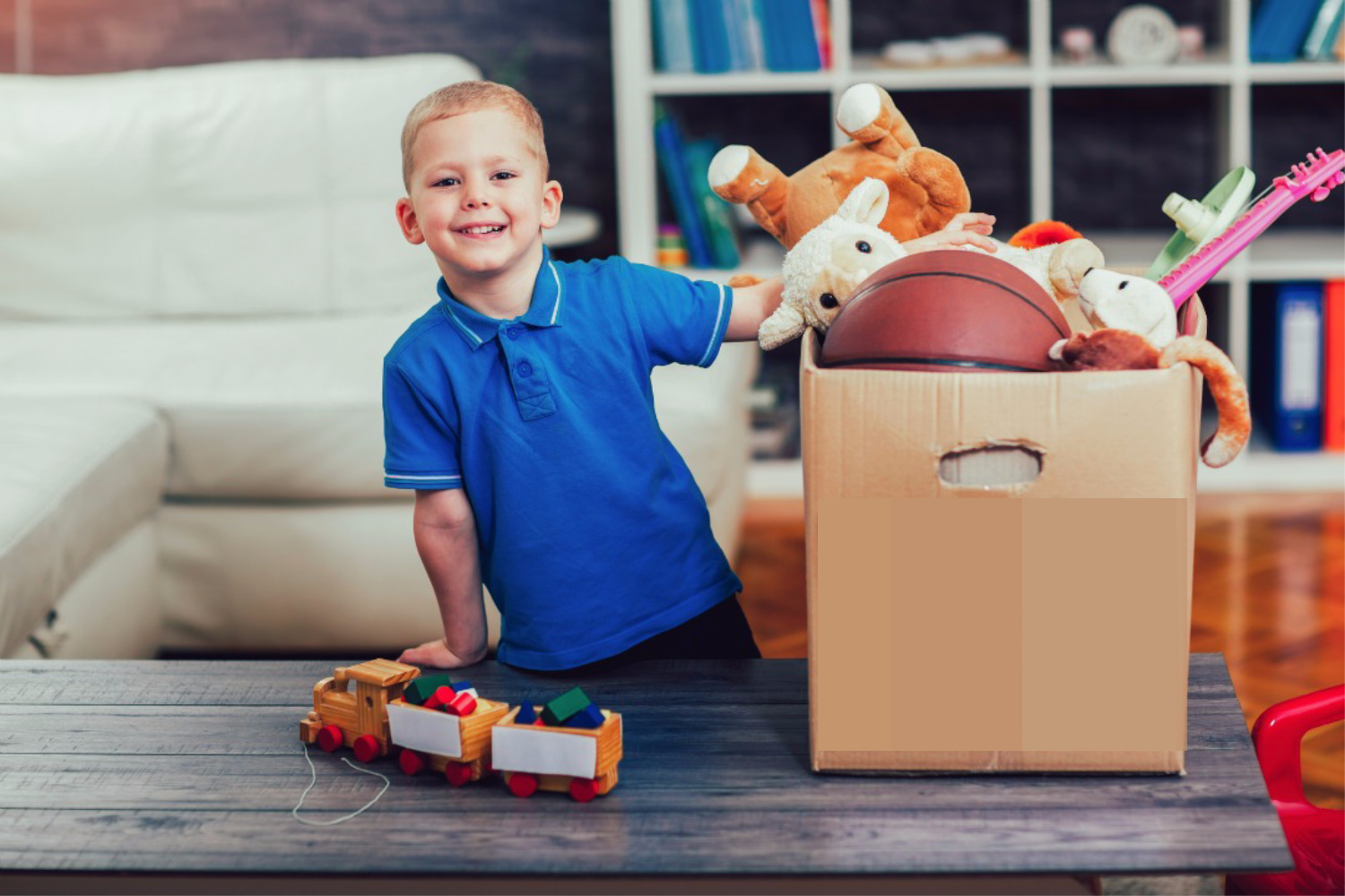 boy picking up toys. Kitchen clutter solutons