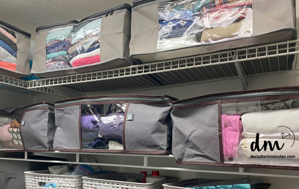 zipper storage bags on a shelf in a closet