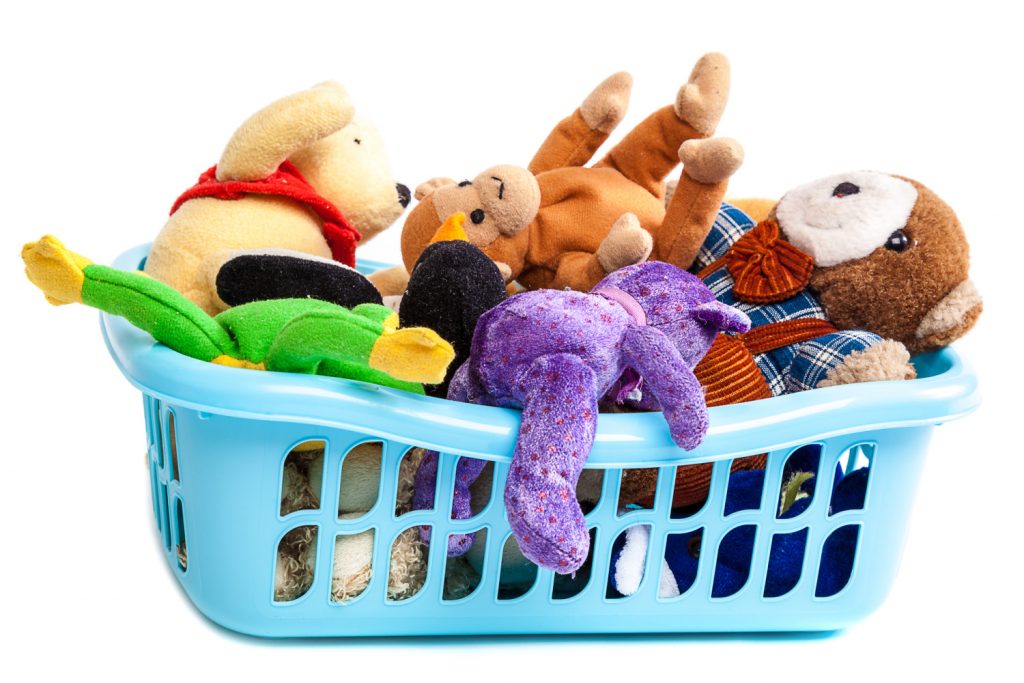 a basket full of toys. Easy decluttering tips you can do today.