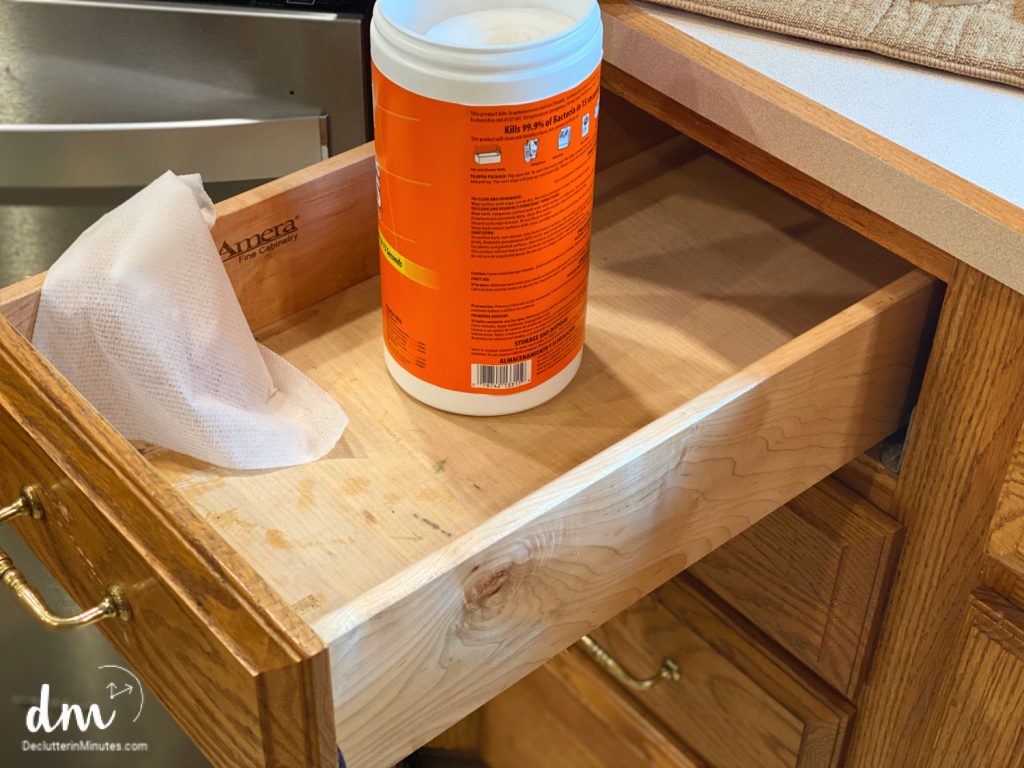 a rag in an empty drawer waiting to be cleaned