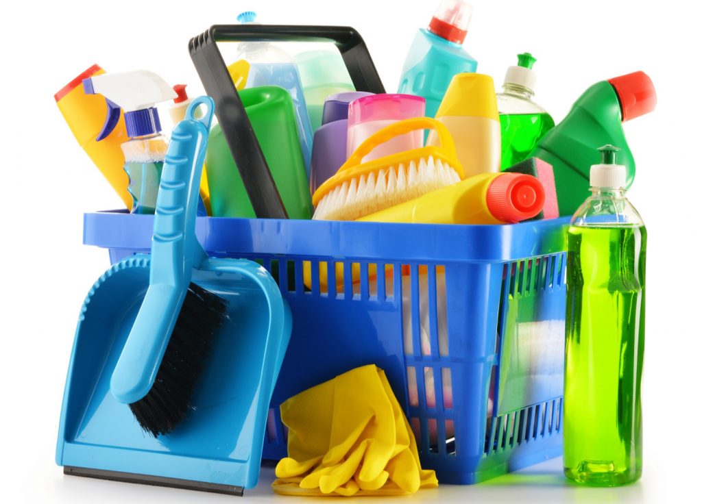 bin of cleaning supplies. Things to declutter your home checklist