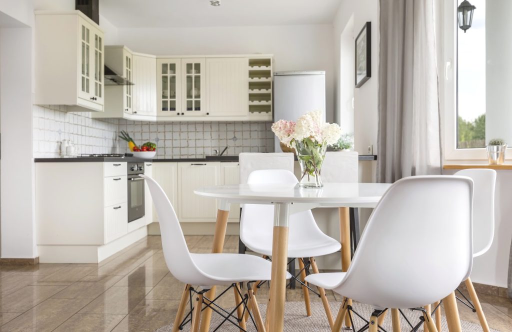 a neat white kitchen that is clutter free