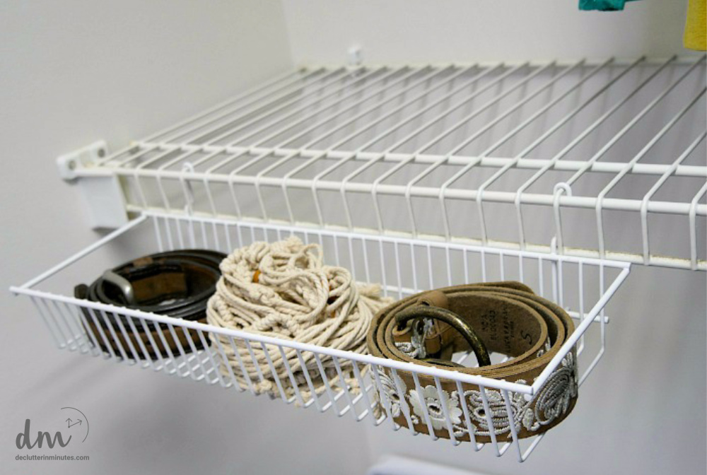 belts in a closet basket