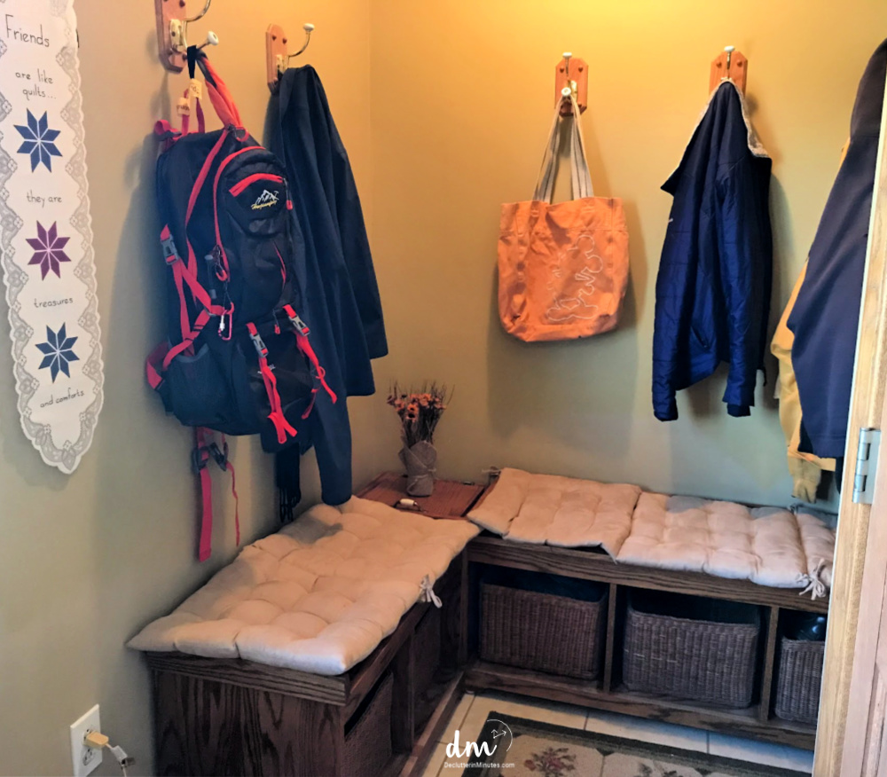 mudroom organized with baskets