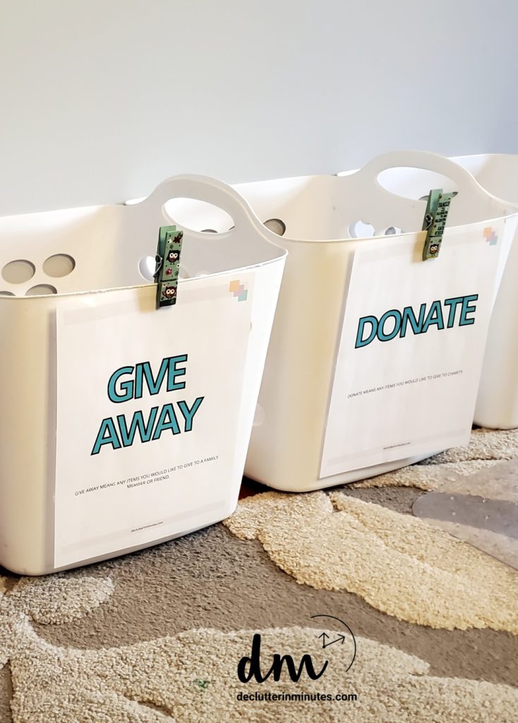 white baskets labeled give away and donate