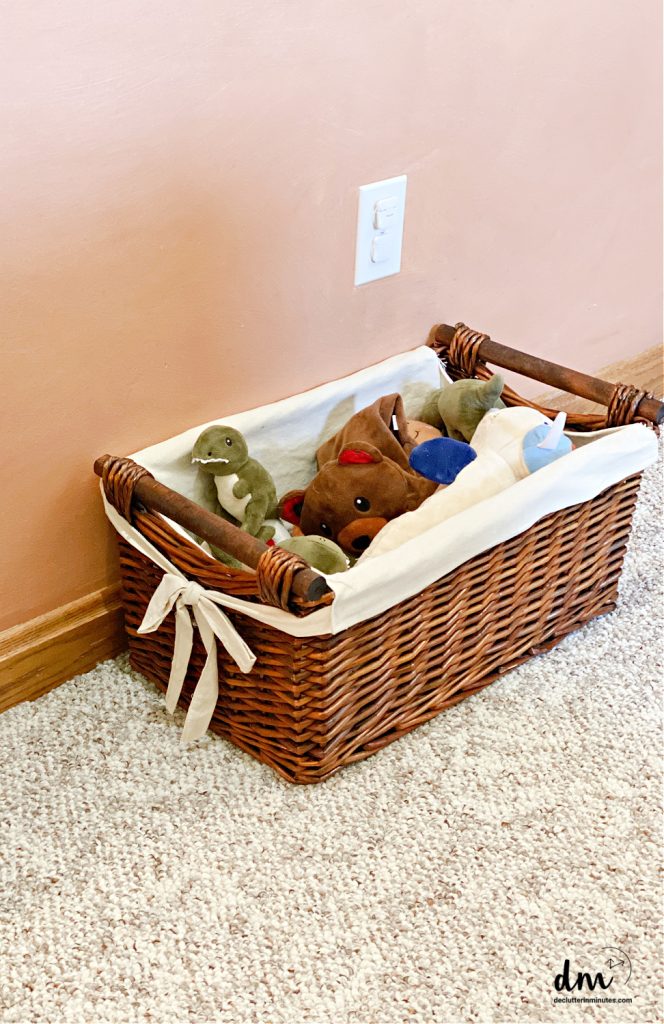 a basket with pet toys inside