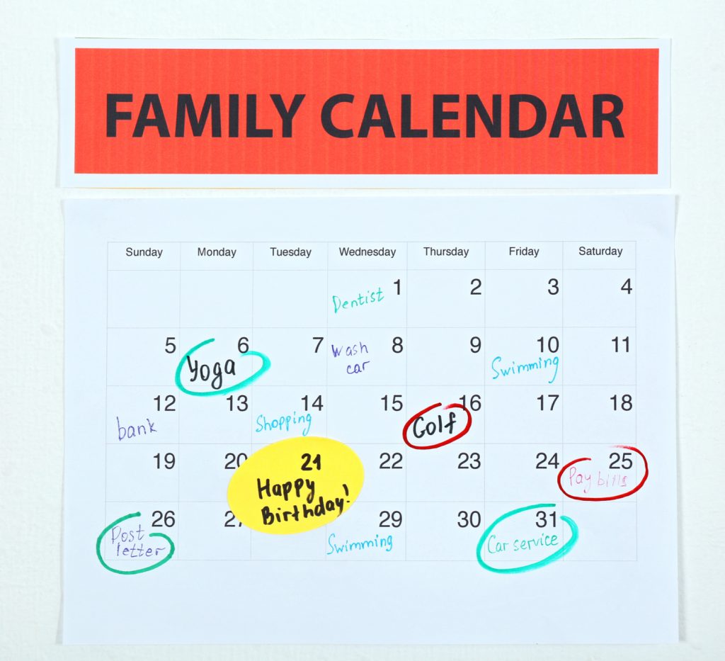 Family calendar planner hanging on the wall
