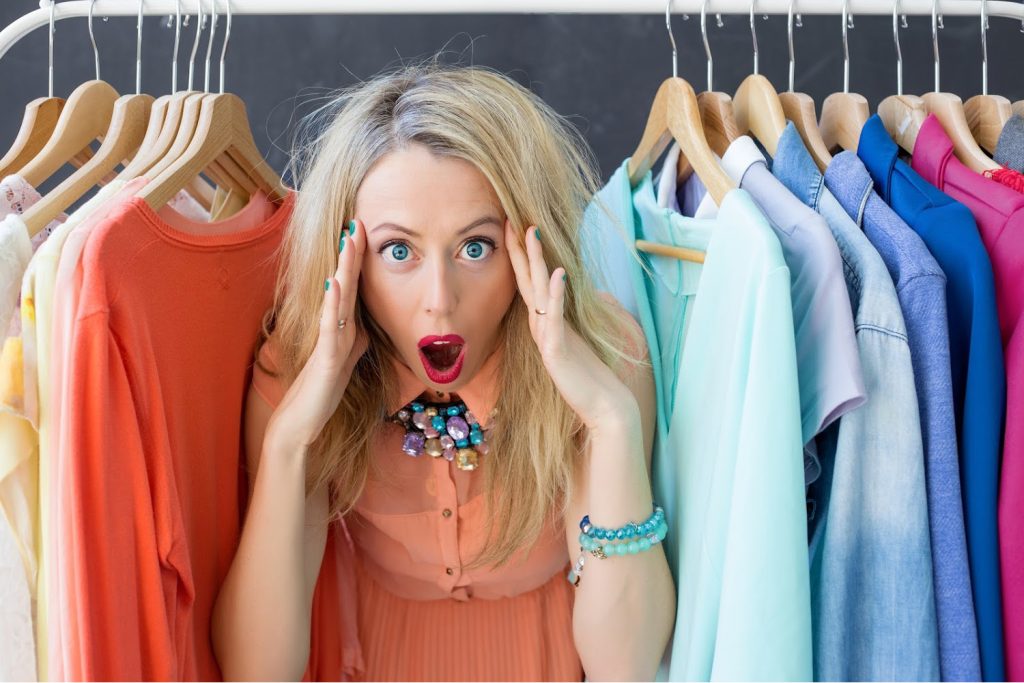 woman upset by the clothes in her closet