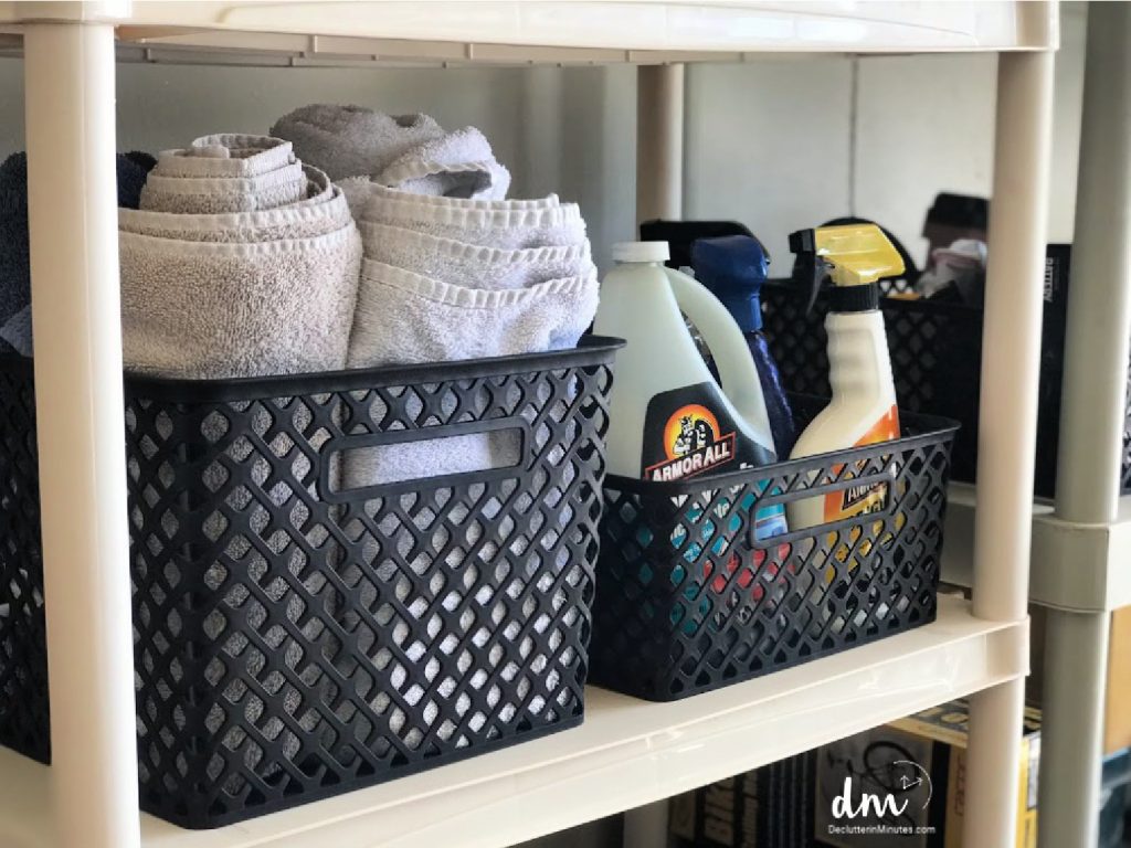 a basket of car wash supplies in a garage