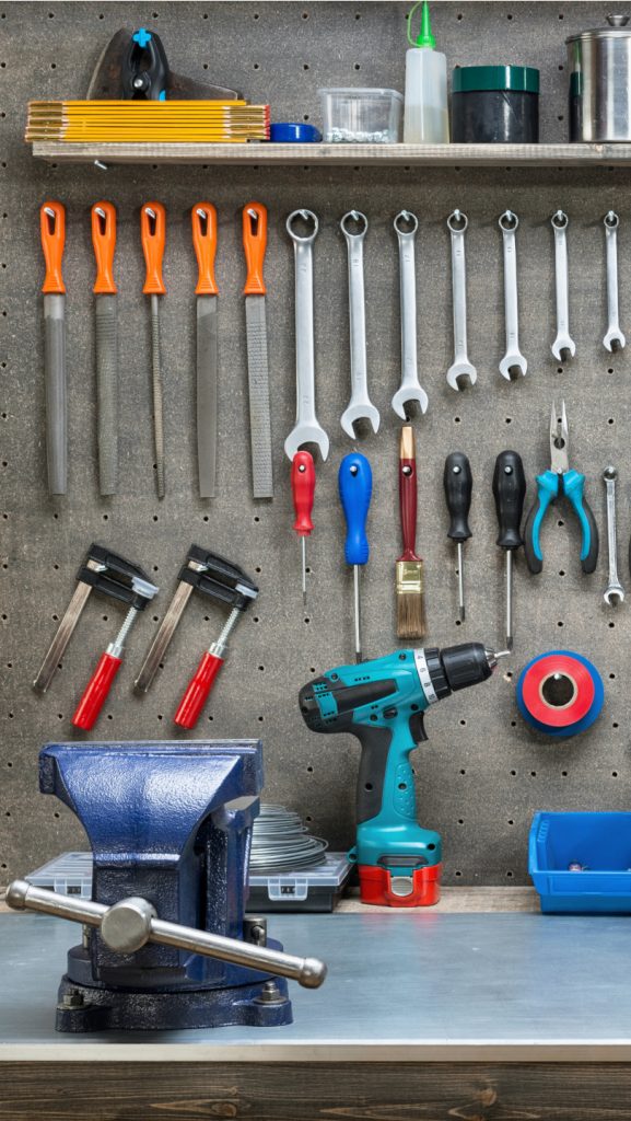 Workshop scene. Tools on the table and board.