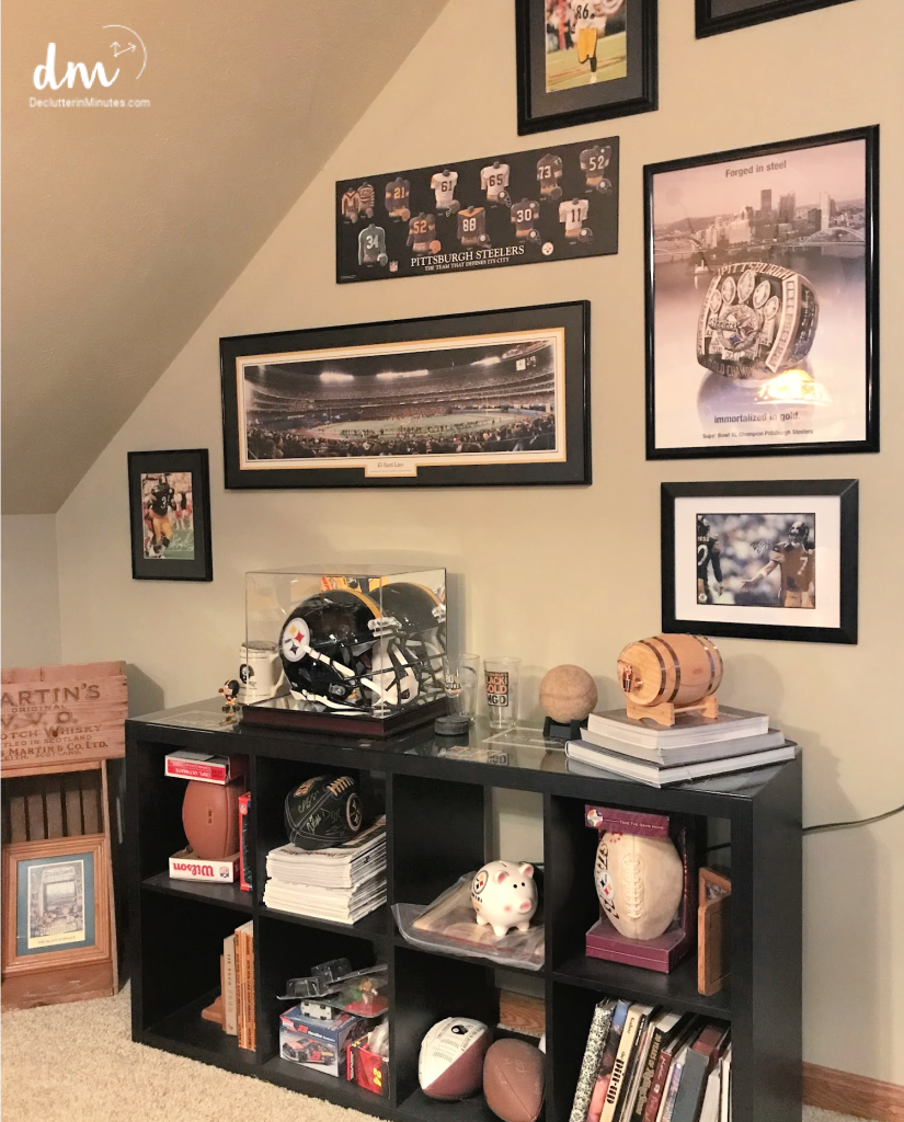 a collection of steelers memorabilia in a rec room