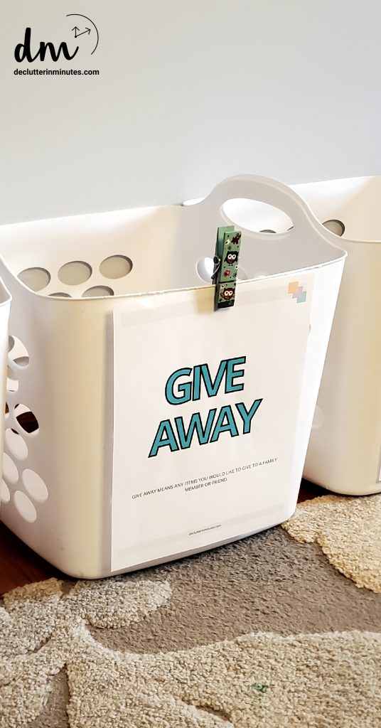 a white basket labeled give away