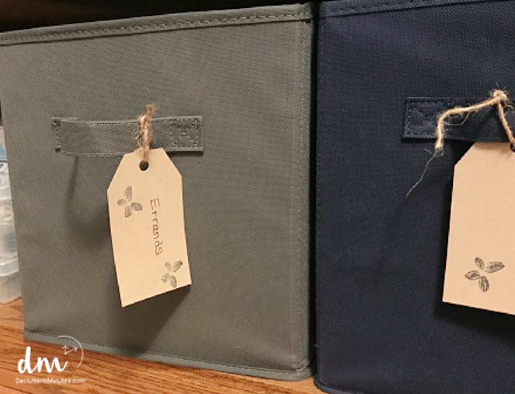 two baskets with one labeled errands on a tag