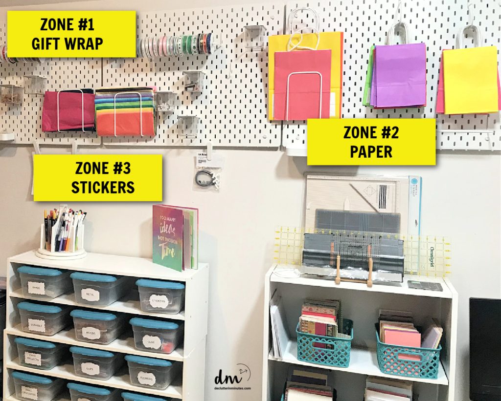an organized wall of containers and pegboard in a craft room