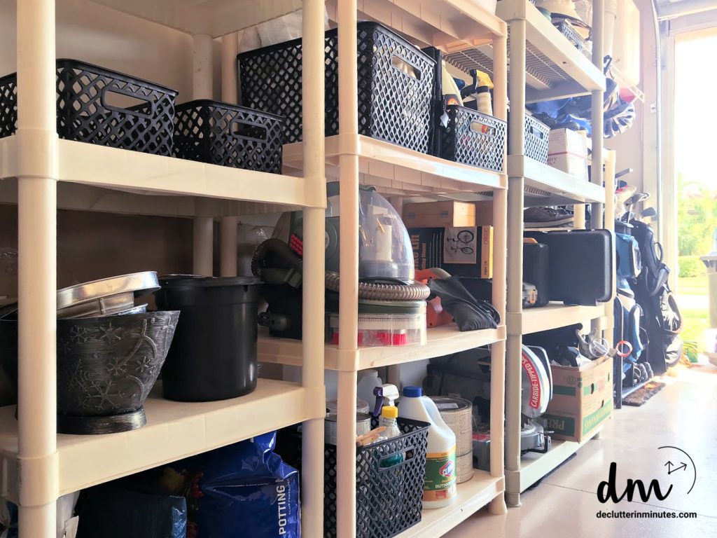 a set of shelves in a garage that are neat and organized
