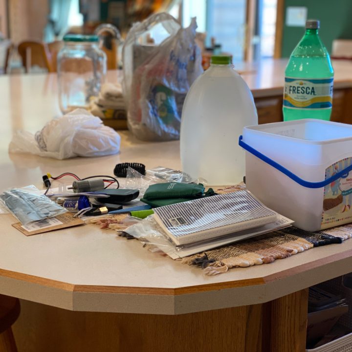 a messy cluttered counter in a kitchen