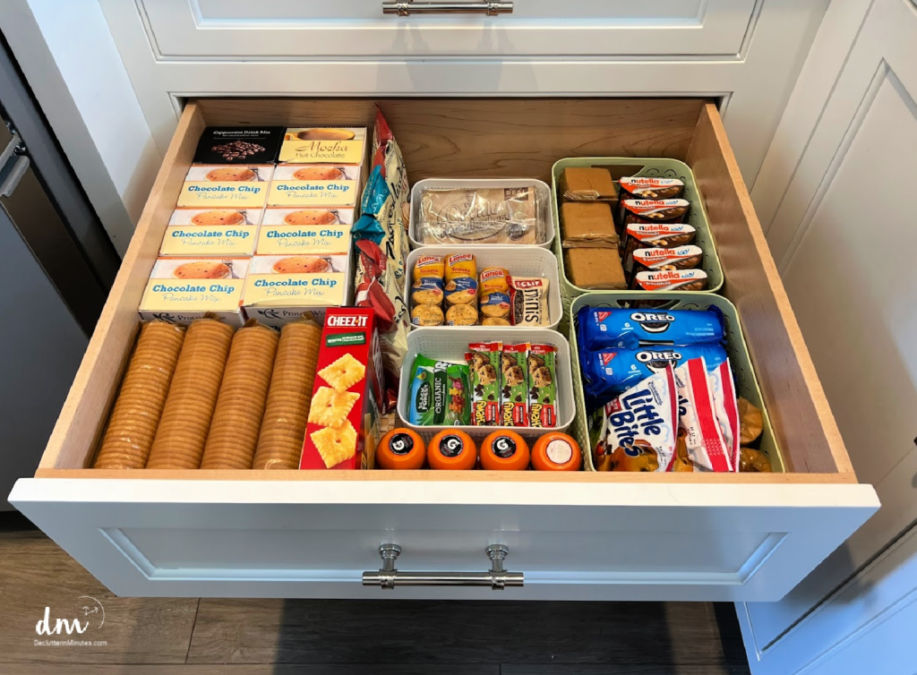 Snack drawer filled with things to eat in a pantry