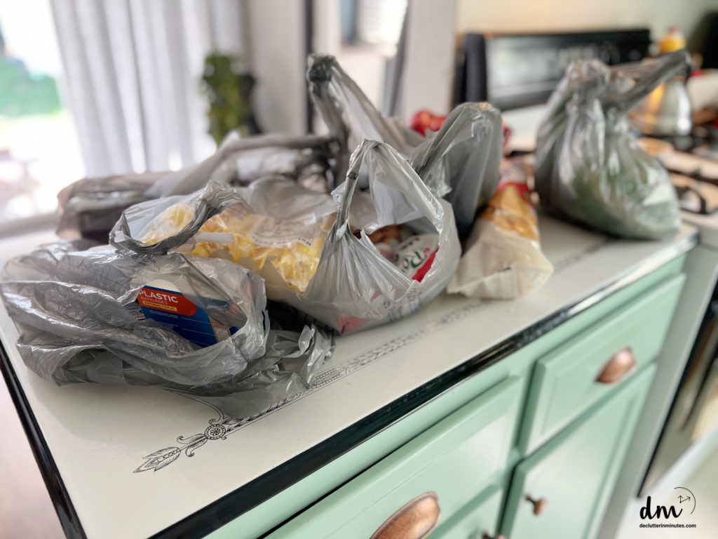 grocery bags on a kitchen counter