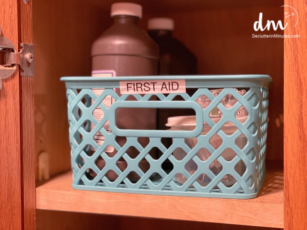 a basket labeled first aid