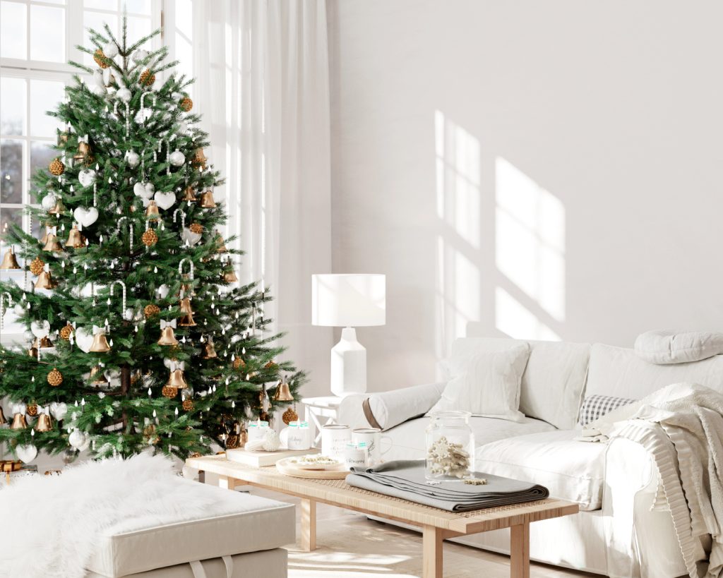 a christmas tree in a white family room