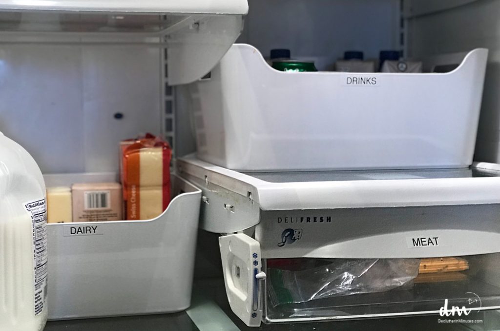 white containers in a refrigerator