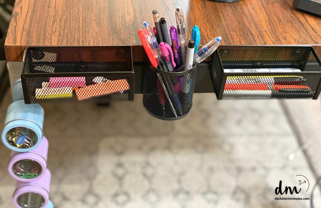 magnet desk organizers holding office supplies in a tiny office