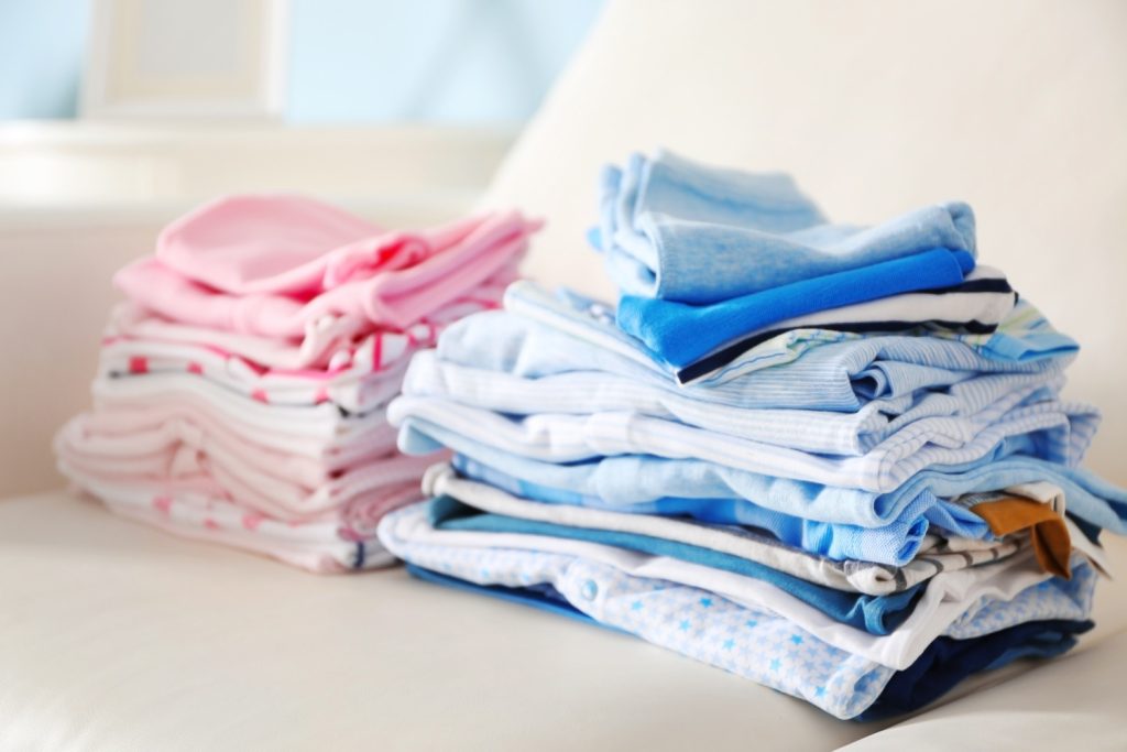 Pile of baby clothes, close up