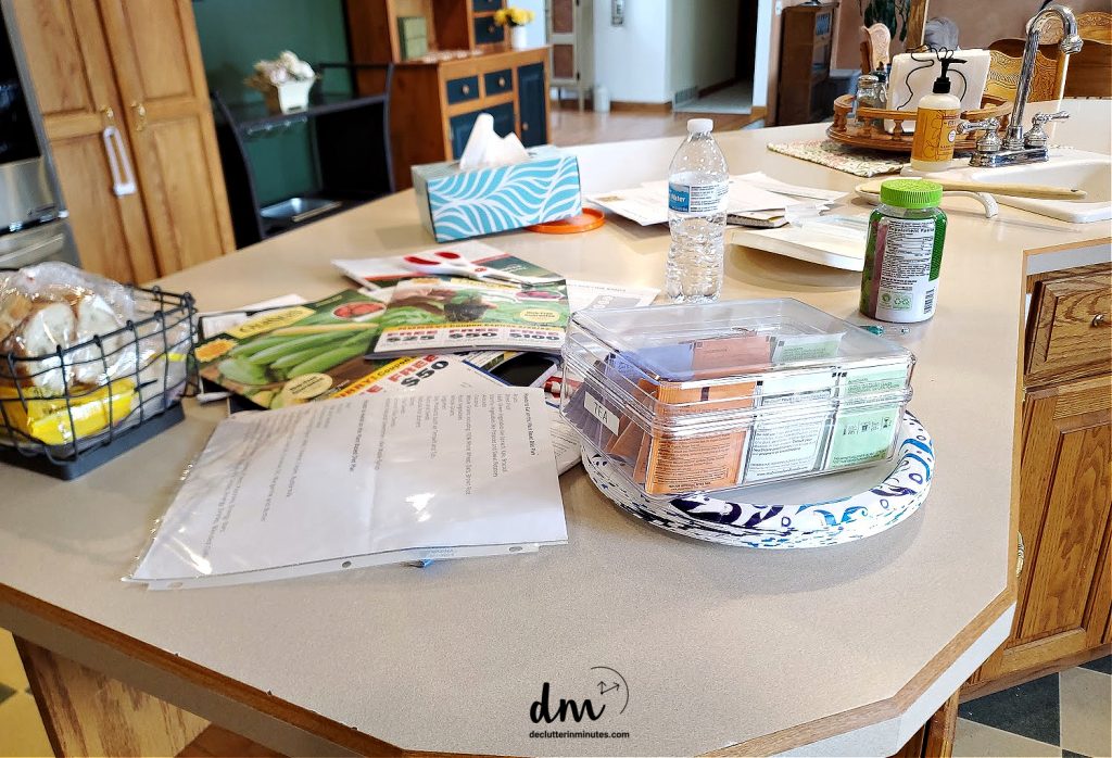 messy kitchen counter covered in clutter