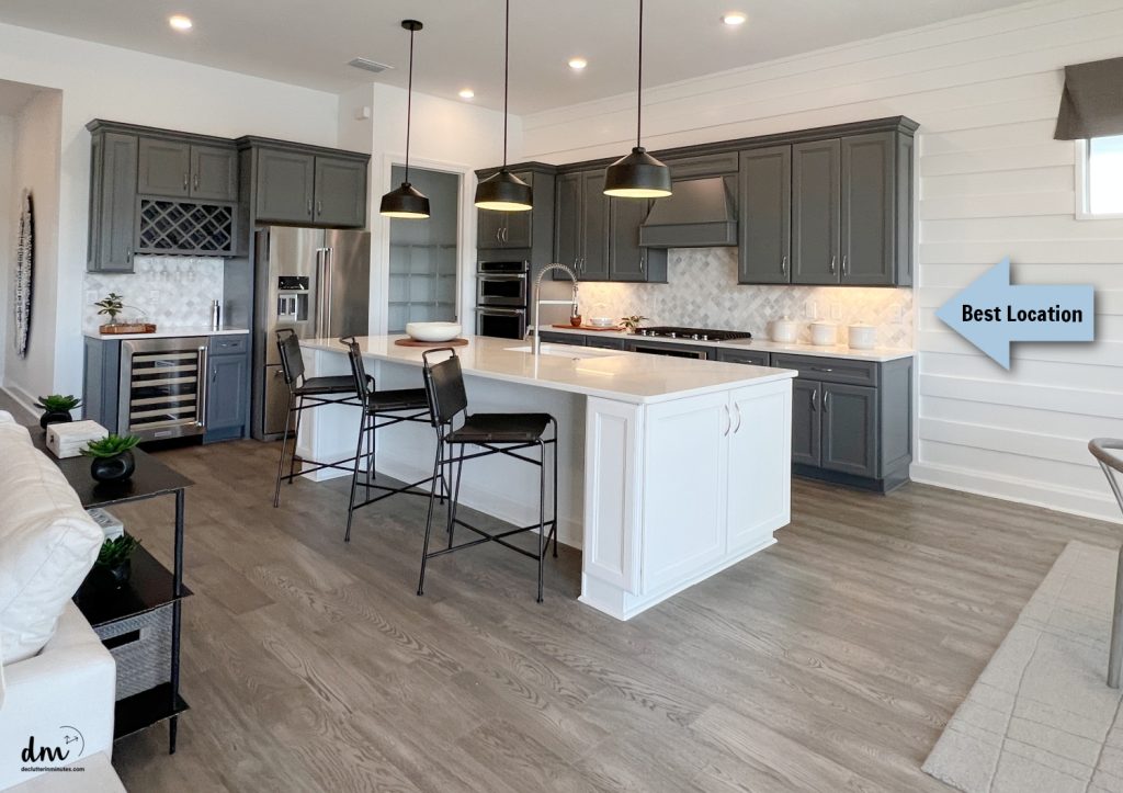 a beautiful kitchen with dark cabinets