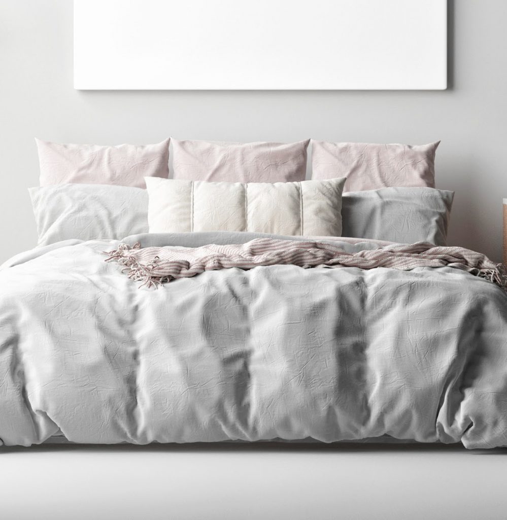 a cozy bed in an organized bedroom