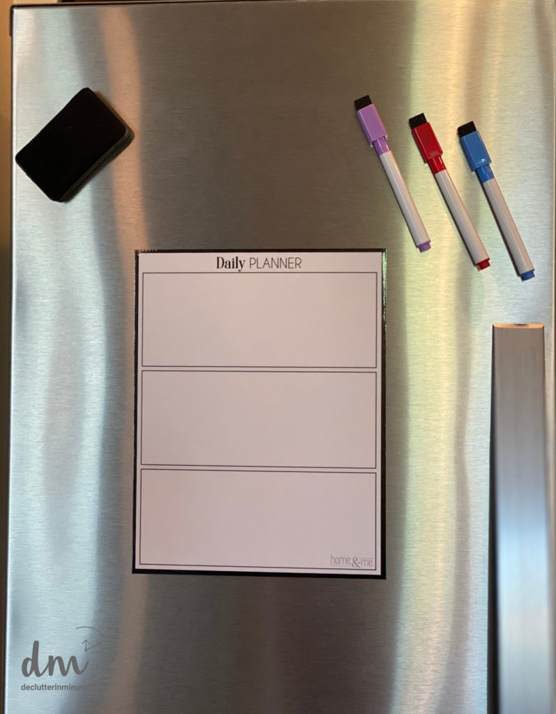 a to do list on the front of a fridge command center