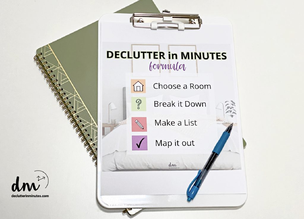 DM Formula on a clipboard with a pen copy that you can use to fix messy craft rooms