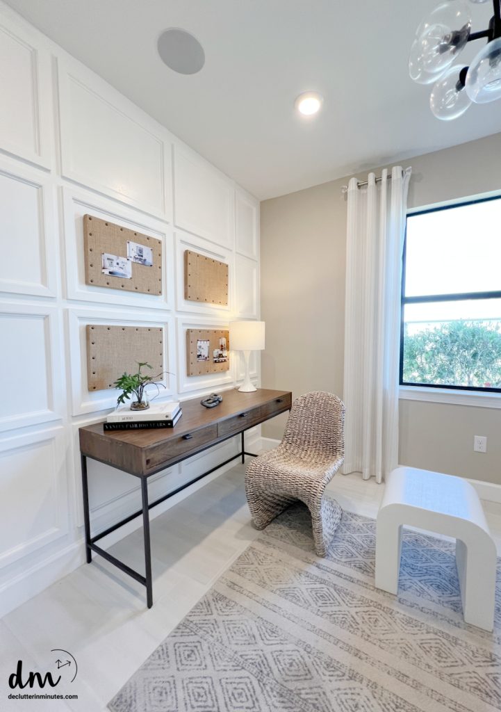 a small desk in a tidy home office