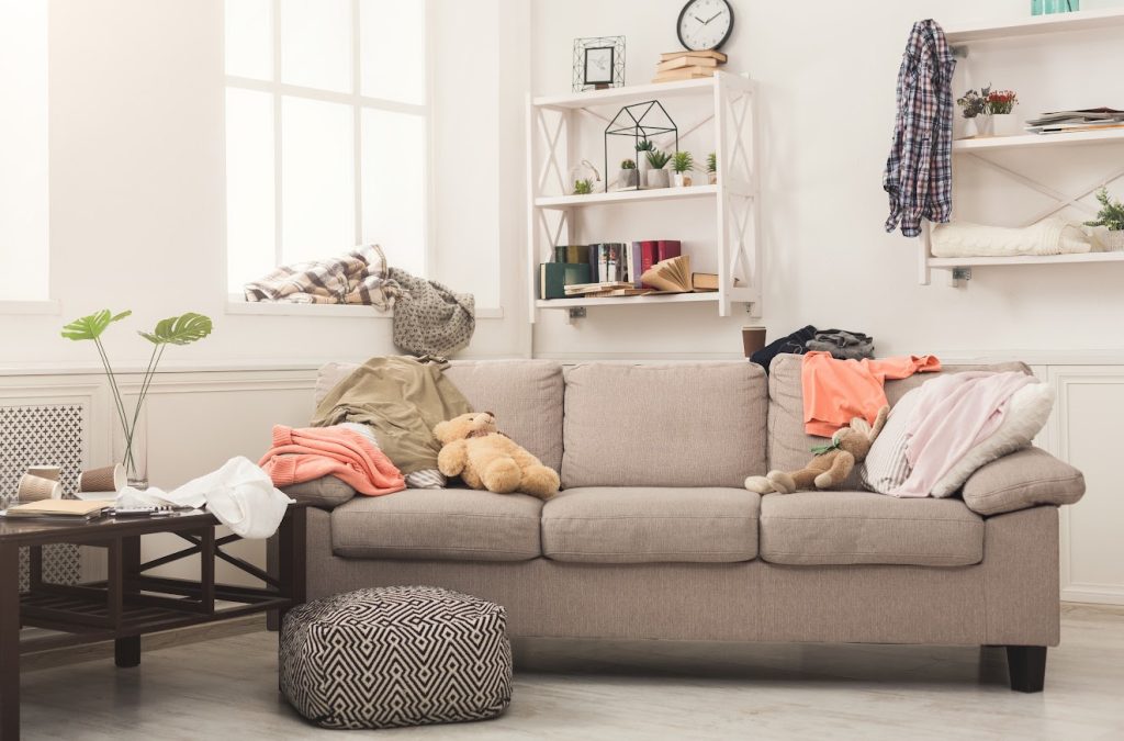 A messy family room of clutter copy