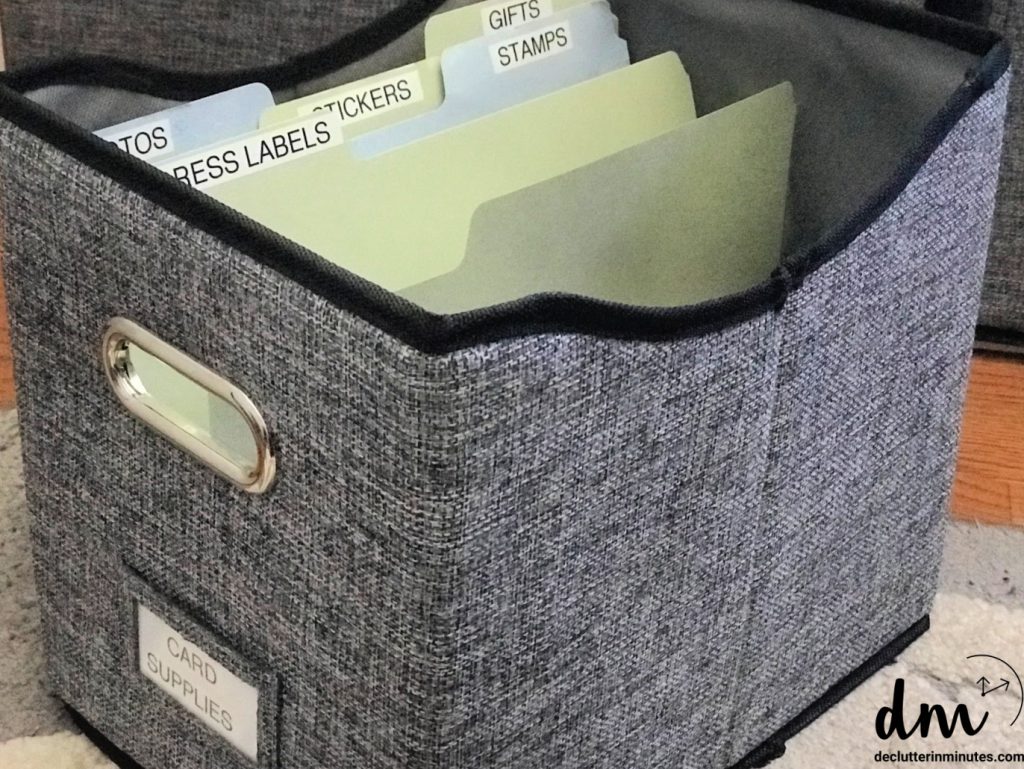 a basket with files inside labeled for different card supplies