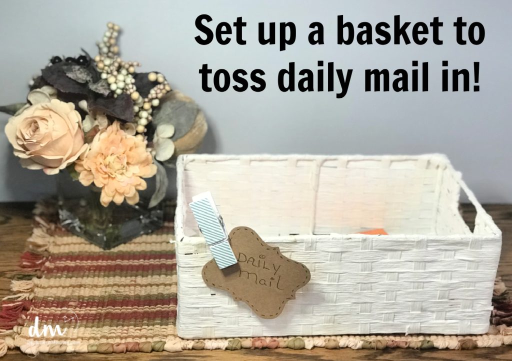 a white basket with a brown tag that says mail
