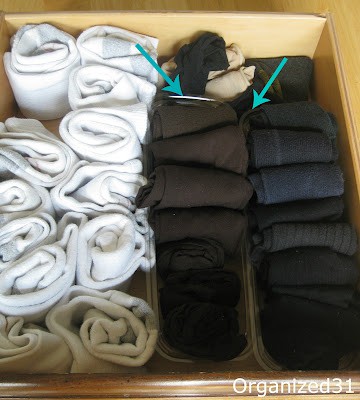 Image that shows take out plastic containers used to sort socks in a drawer.