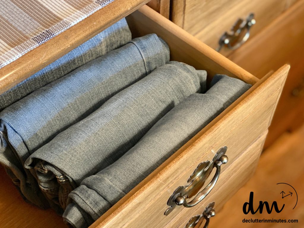 jeans file-folded vertically in an organized dresser drawer