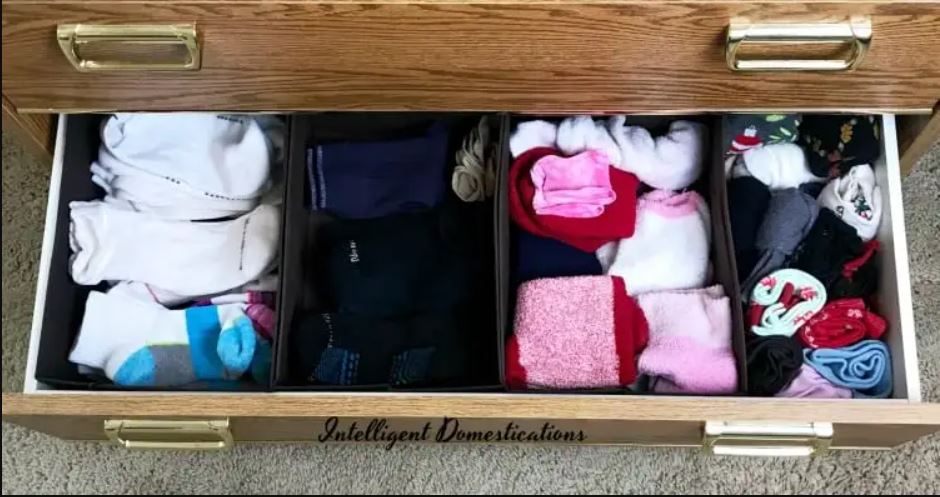 Image that shows cloth baskets used in a dresser drawer to sort socks.