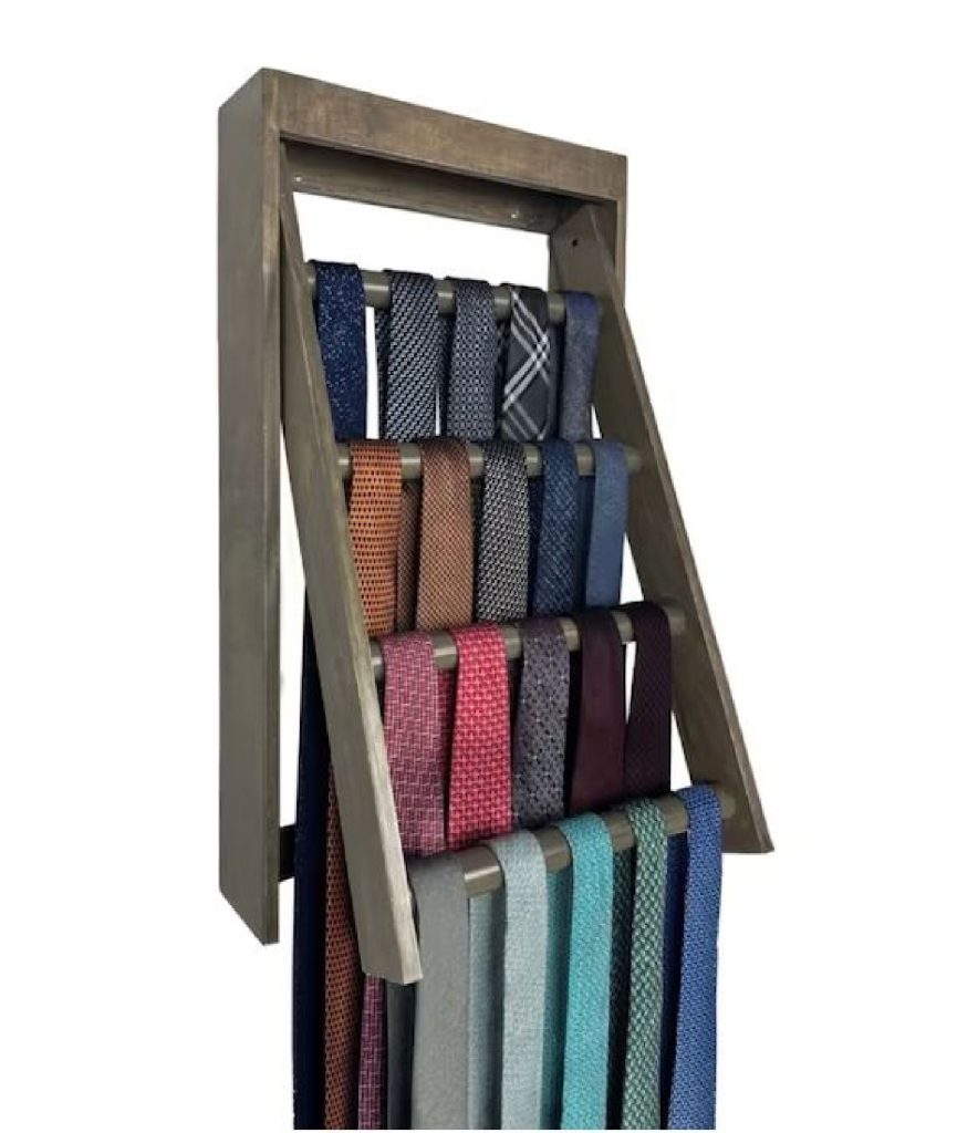 Image that shows a wooden tie rack with multiple racks holding ties.