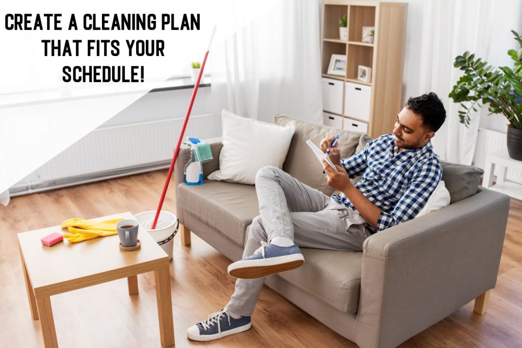 a man making a list on a couch with cleaning supplies all around him