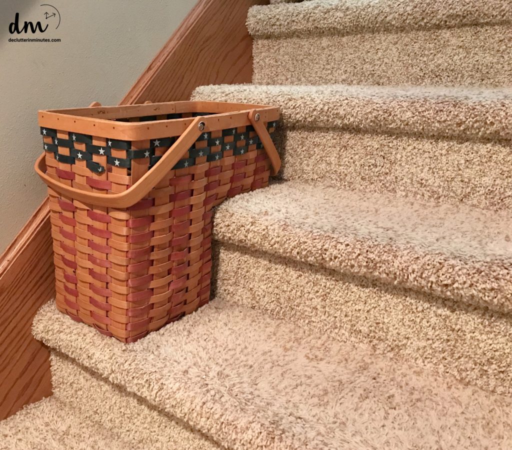 a whicker basket on a set of stairs