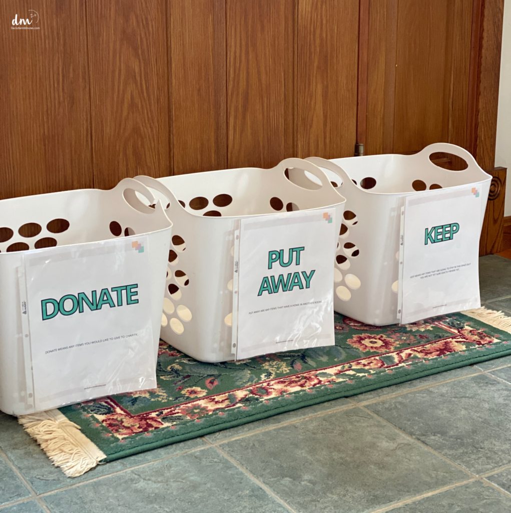 3 sorting bins in front of a door