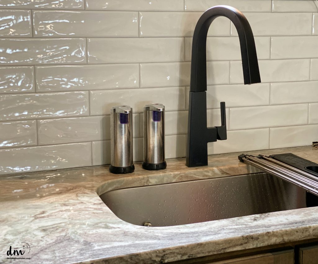 a clutter free sink in a kitchen
