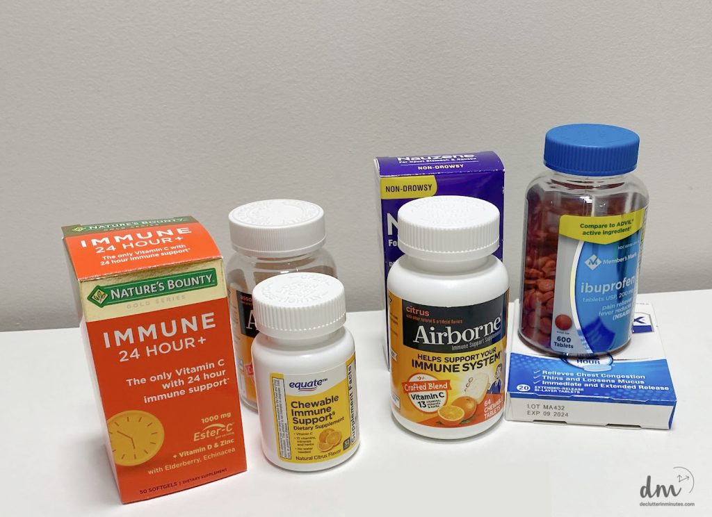 medicines and vitamins sitting on a counter