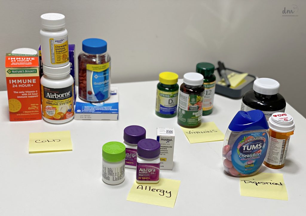 medicines sorted out with sticky notes labels on a table 