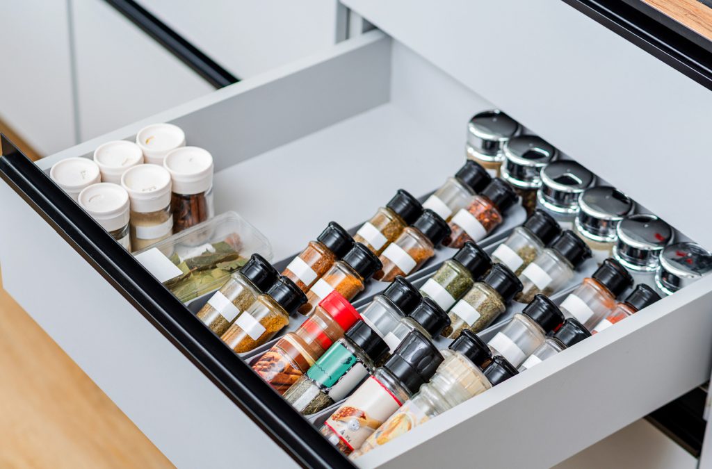 spices arranged in a kitchen drawer