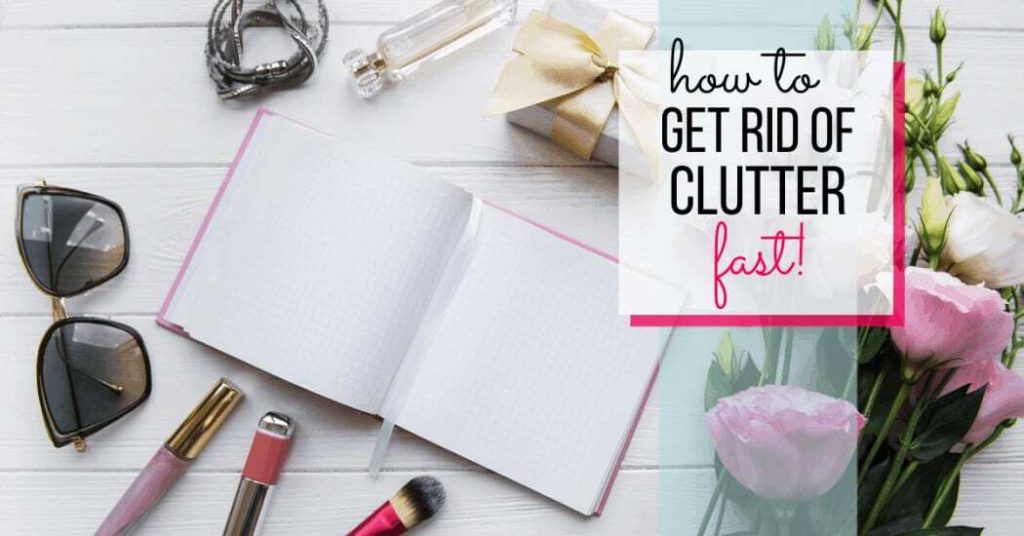 notebook with sunglasses, pens, makeup essentials and flowers