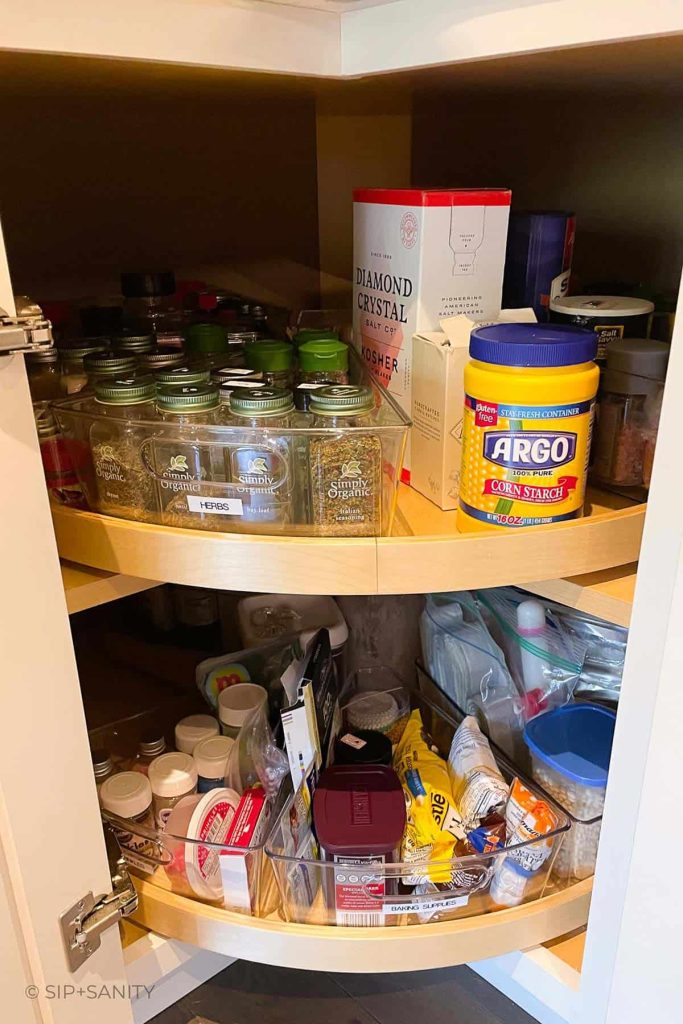 lazy susan in a cabinet with spices